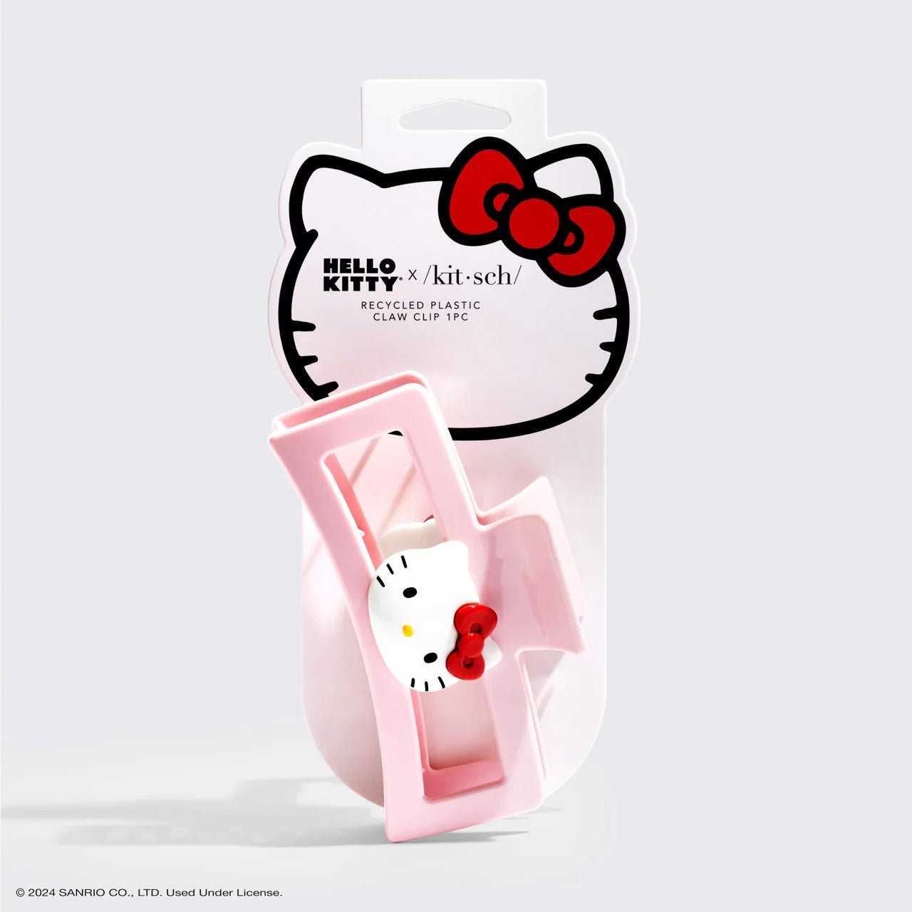 Shop Kitsch Hello Kitty x Kitsch Recycled Plastic Jumbo Open Shape Claw Clip 1pc - Hello Kitty Face Hair Band for women – premium loungewear and festival fashion at Spoiled Brat