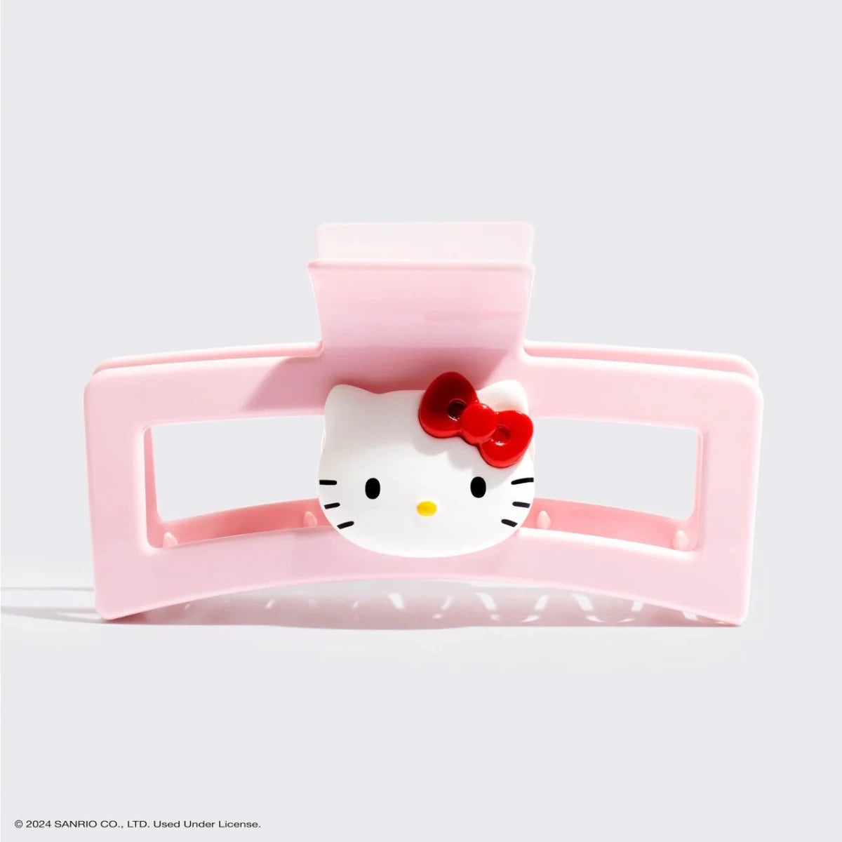 Shop Kitsch Hello Kitty x Kitsch Recycled Plastic Jumbo Open Shape Claw Clip 1pc - Hello Kitty Face Hair Band for women – premium loungewear and festival fashion at Spoiled Brat
