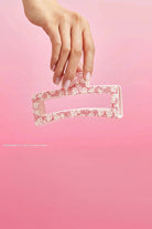 Shop Kitsch Hello Kitty x Kitsch Recycled Plastic Jumbo Open Shape Claw Clip Hair Band for women – premium loungewear and festival fashion at Spoiled Brat