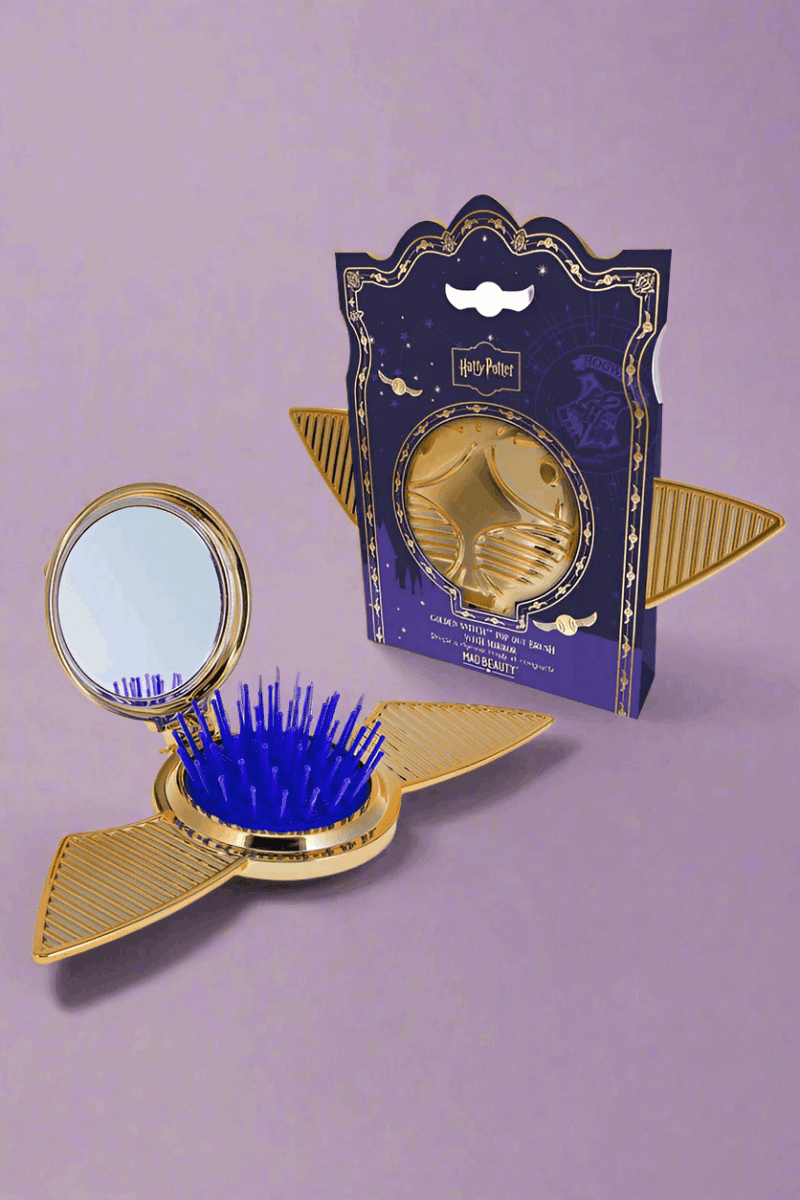 Shop Mad Beauty Harry Potter Snitch Pop out Brush Hair Brush for women – premium loungewear and festival fashion at Spoiled Brat