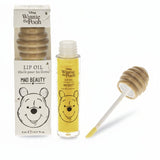 Shop Mad Beauty Mad Beauty Winnie The Pooh Lip Oil Lip Gloss for women – premium loungewear and festival fashion at Spoiled Brat