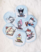 Makeup Eraser Hello Kitty & Friends Aspen Vacation 7-Day Set © Sanrio by Makeup Eraser – Beauty Product – Purple | Spoiled Brat UK