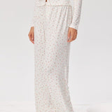 Shop Pixie and Peach Pixie & Peach Peachy Floral Trousers Trousers for women – premium loungewear and festival fashion at Spoiled Brat