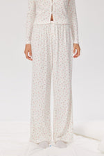 Shop Pixie and Peach Pixie & Peach Peachy Floral Trousers Trousers for women – premium loungewear and festival fashion at Spoiled Brat