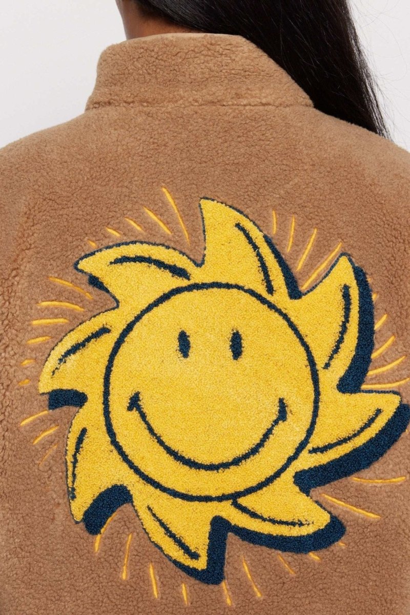 Shop Samii Ryan Samii Ryan Smiley® Sunshine Sherpa Jacket as seen on Sarah Jayne Dunn Jacket for women – premium loungewear and festival fashion at Spoiled Brat