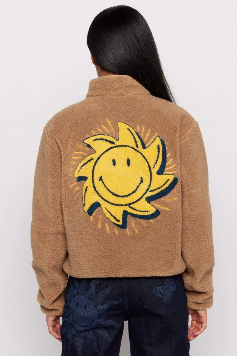Shop Samii Ryan Samii Ryan Smiley® Sunshine Sherpa Jacket as seen on Sarah Jayne Dunn Jacket for women – premium loungewear and festival fashion at Spoiled Brat