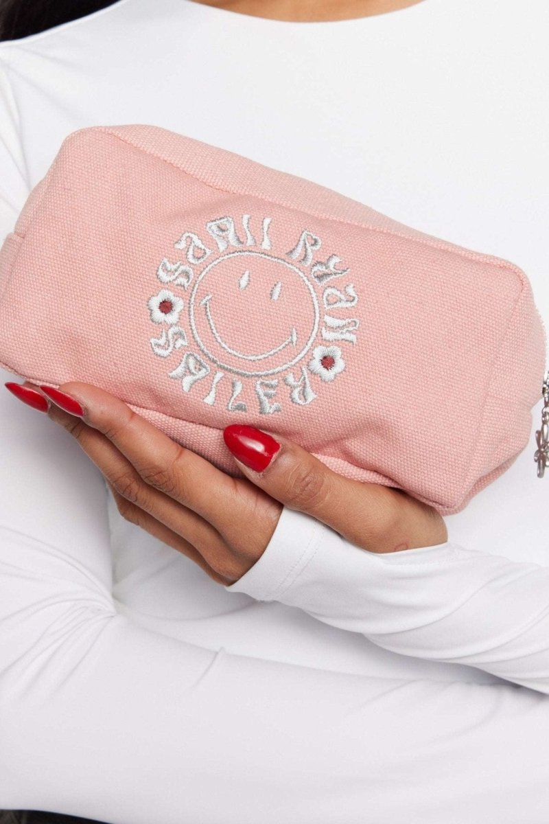 Shop Samii Ryan Samii Ryan x Smiley® Find Positivity Makeup Bag Cosmetic Case for women – premium loungewear and festival fashion at Spoiled Brat