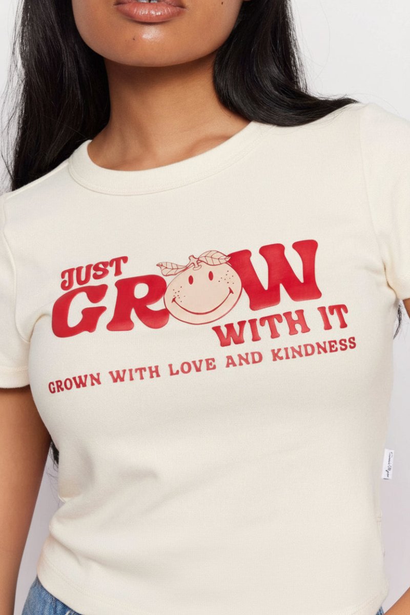 Shop Samii Ryan Samii Ryan x Smileyworld® Just Grow With It Baby Tee T-Shirt for women – premium loungewear and festival fashion at Spoiled Brat