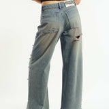 Shop The Ragged Priest The Ragged Priest Dirty Wash Distressed Release Stud Jeans Boyfriend Jeans for women – premium loungewear and festival fashion at Spoiled Brat