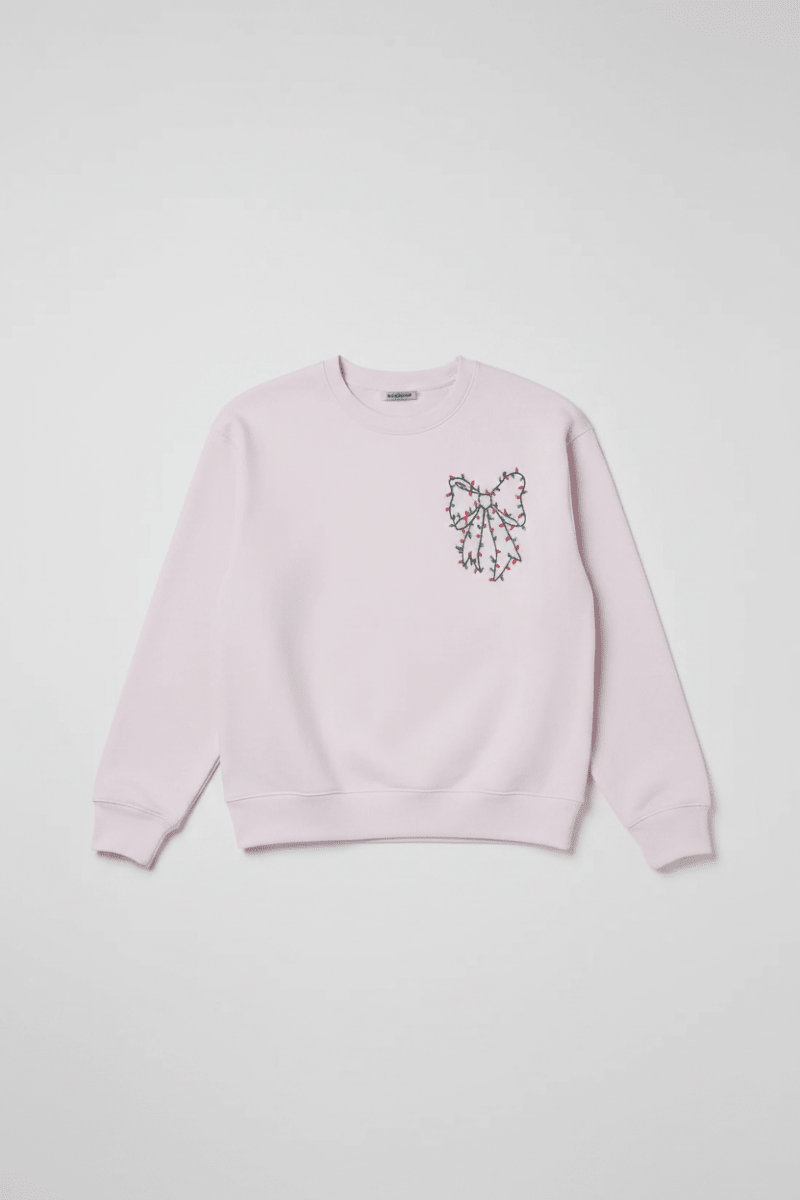 Shop Wildfox Wildfox Christmas Bow Charlie Sweatshirt Hooded Sweatshirt for women – premium loungewear and festival fashion at Spoiled Brat