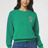 Shop Wildfox Wildfox Christmas Tinis & Tinsel Keely Raglan Sweatshirt Hooded Sweatshirt for women – premium loungewear and festival fashion at Spoiled Brat