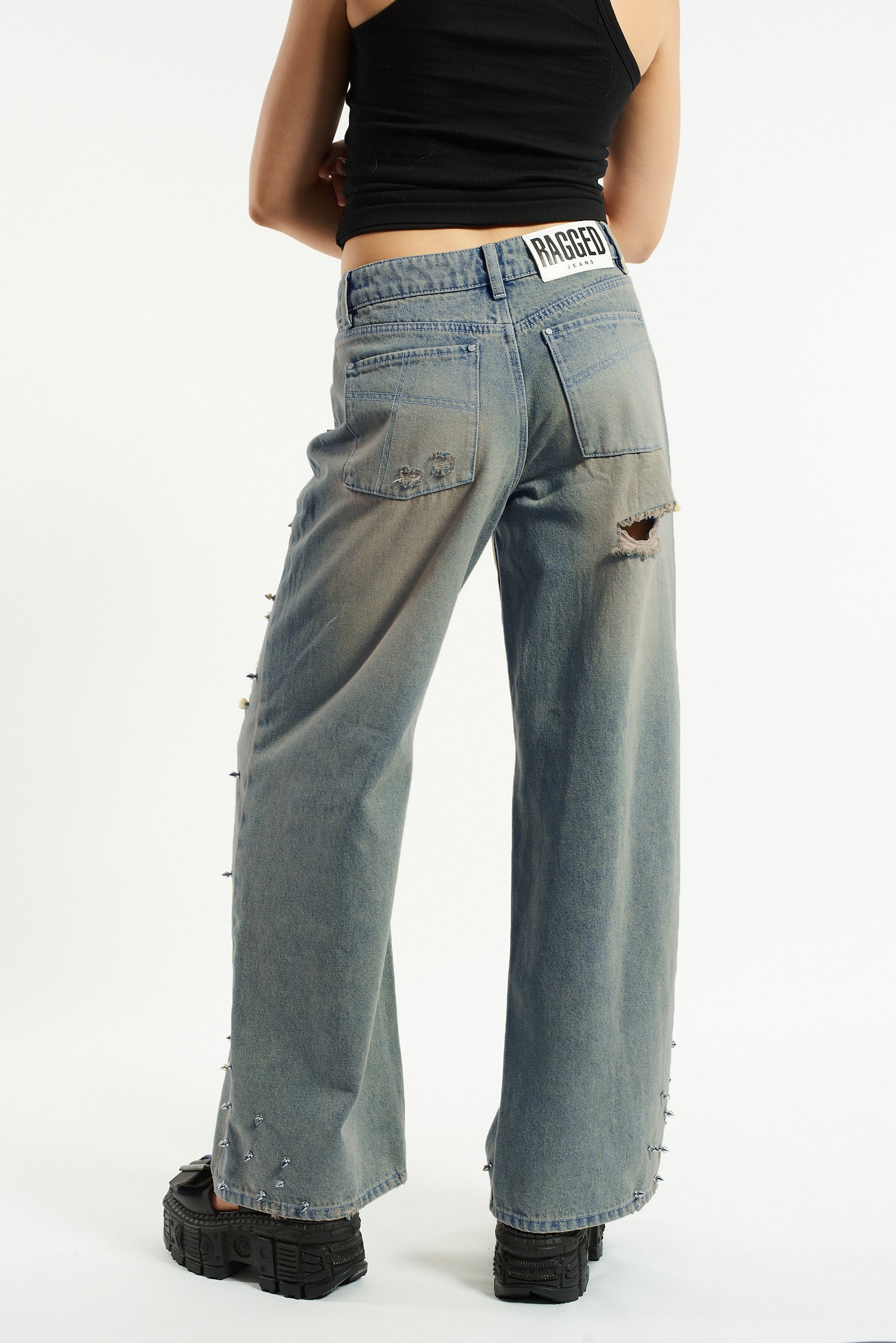 Shop The Ragged Priest The Ragged Priest Dirty Wash Distressed Release Stud Jeans online at Spoiled Brat