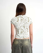 The Ragged Priest Rift Baby Tee Top by The Ragged Priest as seen on celebrities