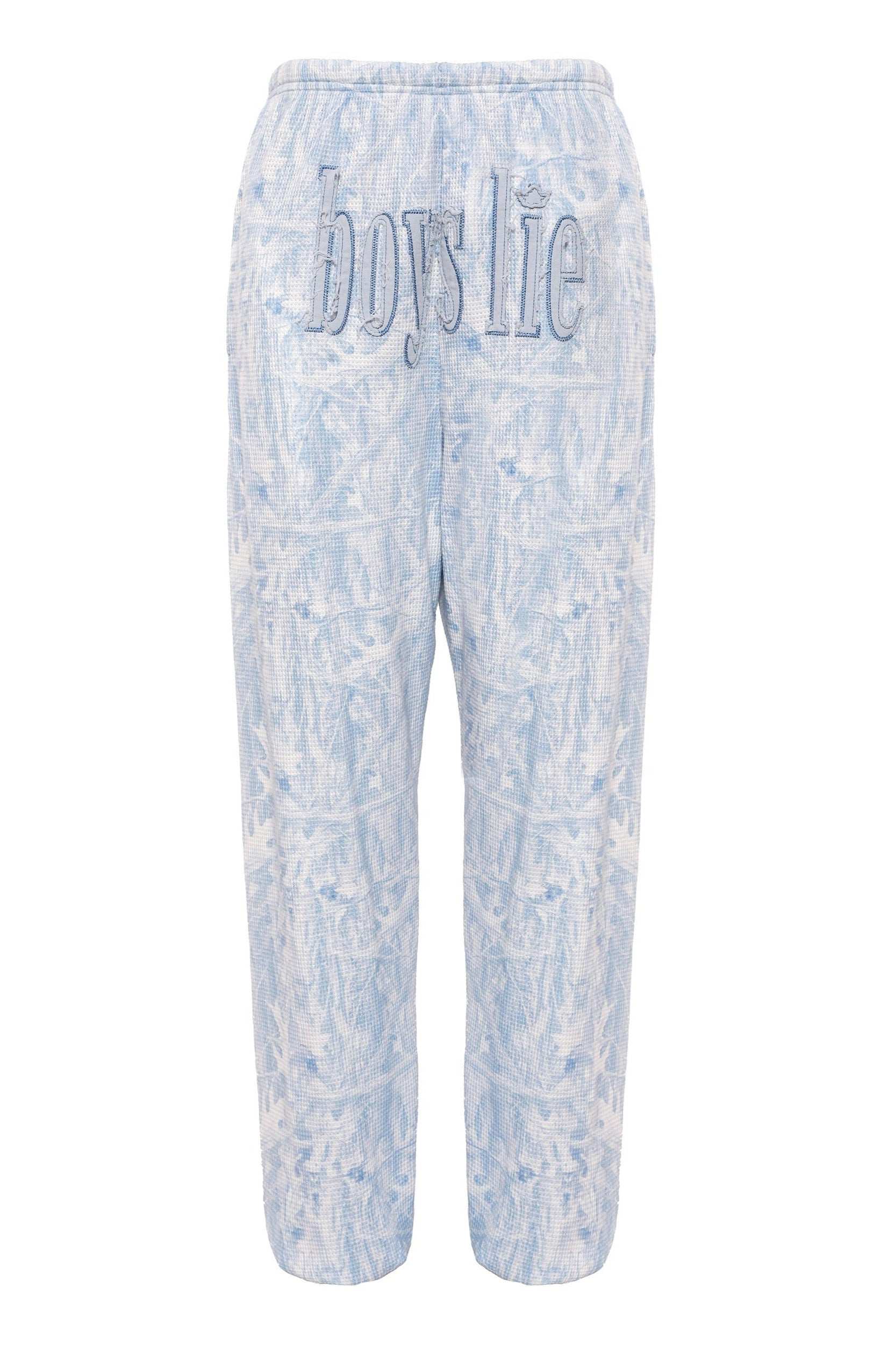 Light blue tie-dye pants with 'Boys Lie' text on a white background