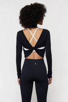 Spiritual Gangster Femme Twist Back Long Sleeve Top Tank Top by Spiritual Gangster as seen on celebrities