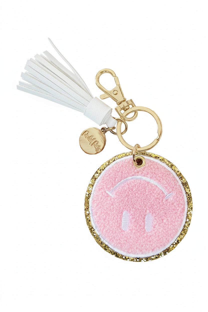 Packed Party Keep Cozy Smiley Keychain by Packed Party – Keyring – Pink | Spoiled Brat UK