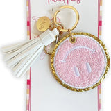 Packed Party Keep Cozy Smiley Keychain by Packed Party – Keyring – Pink | Spoiled Brat UK