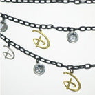 Shop Buckle Down Products Buckle Down Products Disney Logo Charm Chain Belt Belt for women – premium loungewear and festival fashion at Spoiled Brat