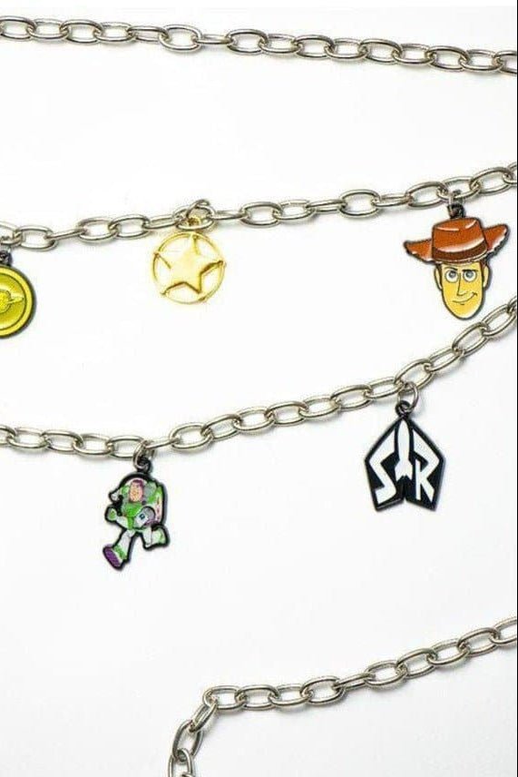 Shop Buckle Down Products Buckle Down Products Disney Toy Story Charm Chain Belt Belt for women – premium loungewear and festival fashion at Spoiled Brat