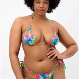 Shop Frankies Bikinis Frankies Bikinis Tia Floral String Bikini Bottom in Neon Surfer Bikini Bottoms for women – premium loungewear and festival fashion at Spoiled Brat