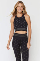 Spiritual Gangster High Neck Jacquard Seamless Black Sports Bra as seen on Miranda Cosgrove Vest Top by Spiritual Gangster as seen on celebrities