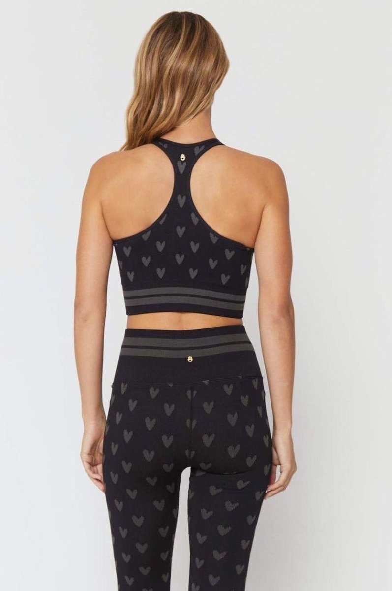 Shop Spiritual Gangster Spiritual Gangster High Neck Jacquard Seamless Black Sports Bra as seen on Miranda Cosgrove Vest Top for women – premium loungewear and festival fashion at Spoiled Brat