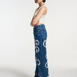 Shop The Ragged Priest The Ragged Priest Peace Printed Dad Jeans as seen on Chloe Sims Boyfriend Jeans for women – premium loungewear and festival fashion at Spoiled Brat