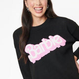Shop Unique Vintage Barbie x Unique Vintage Black Barbie Logo Sweater Sweatshirt for women – premium loungewear and festival fashion at Spoiled Brat